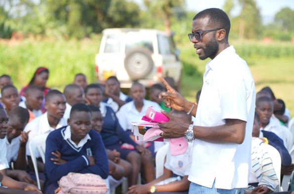 Head of Programs at RAHU Benson Muhindo engaging with the attendees