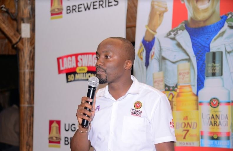 Robert Nsibirwa, the Marketing Manager Spirits at Uganda Breweries addresses guests during the launch of the Laba Swagga promotion at Silver Springs Hotel in Bugolobi.